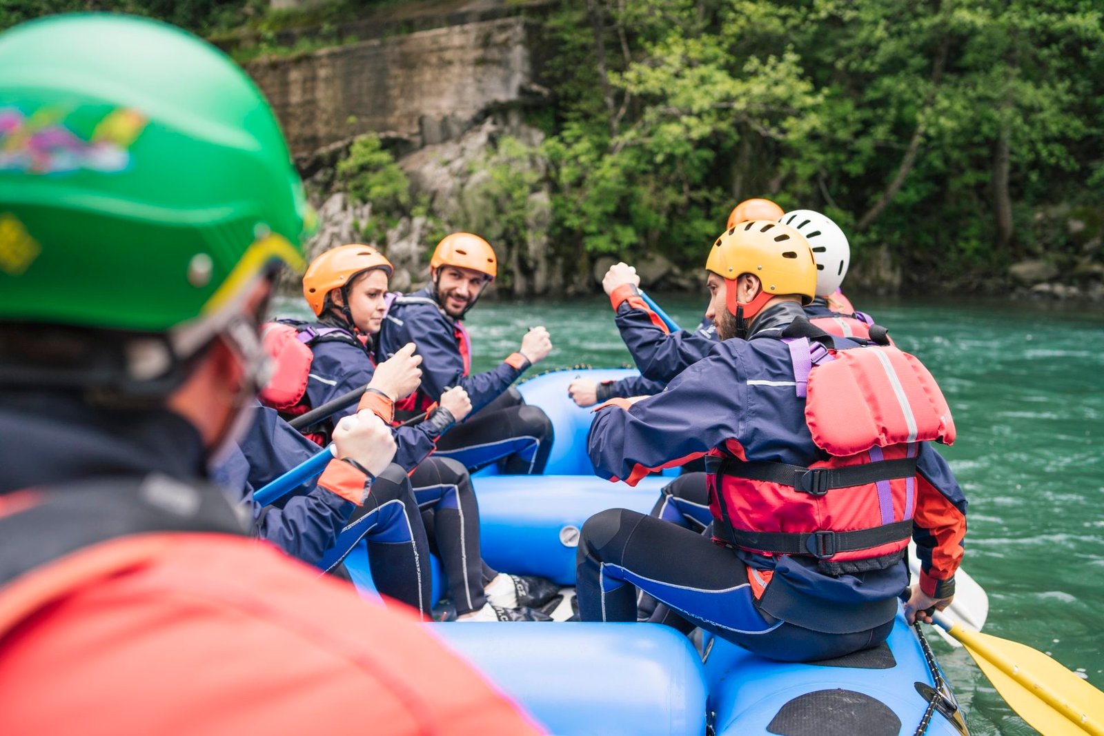 group of people rafting in rubber dinghy on a river 1 e1645292046591 Mallku Expediciones